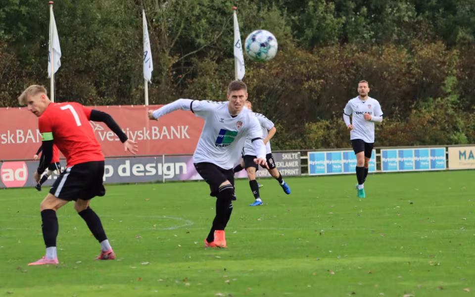 Varde redder point i overtiden