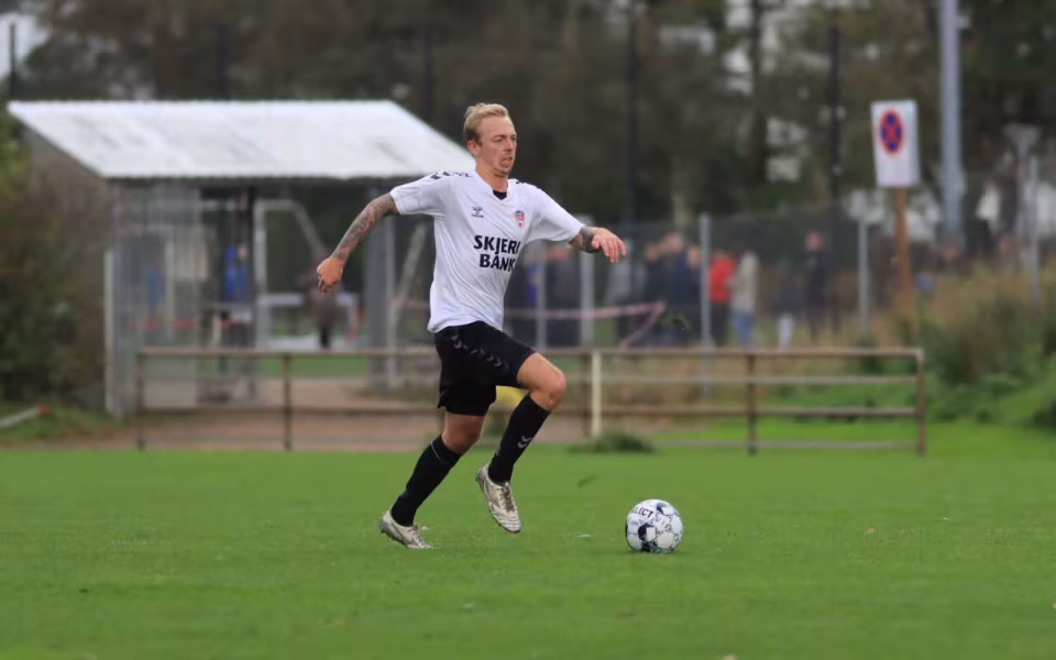 Varde redder point i overtiden