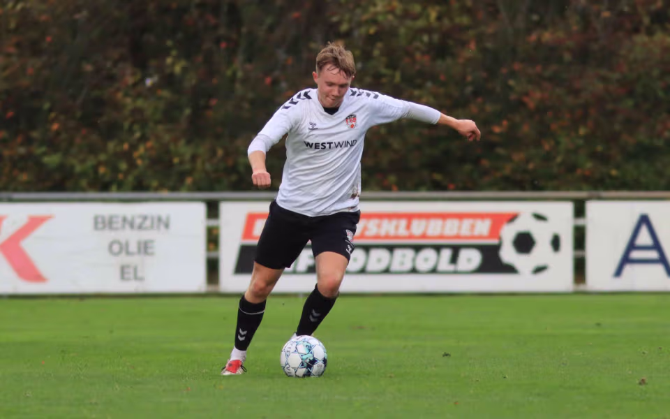 Varde redder point i overtiden