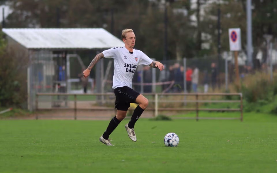 Varde redder point i overtiden