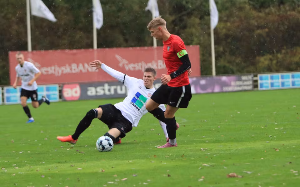 Varde redder point i overtiden