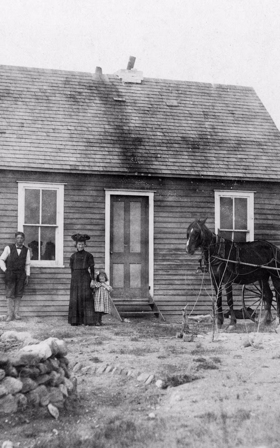 Træhus med familie, hund og hestevogn på Smørdritler fra Skovlund til Ansager